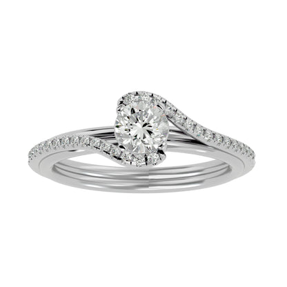 Round by-pass diamond engagement ring