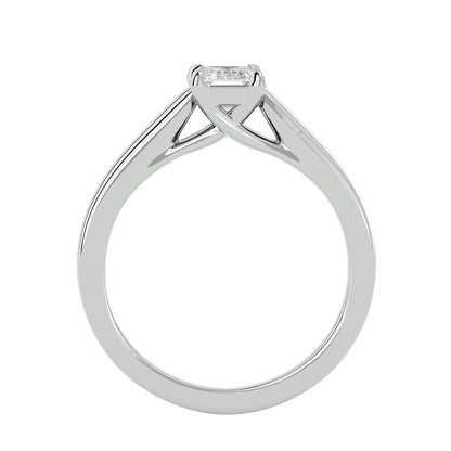 Emerald criss cross diamond engagement ring
