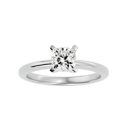 Emerald diamond criss-cross engagement ring
