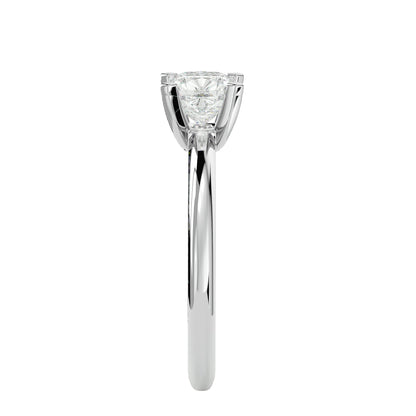Emerald diamond criss-cross engagement ring