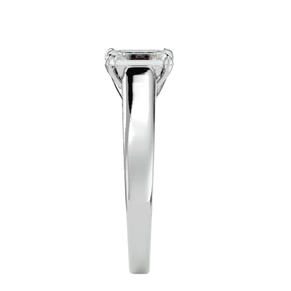 Emerald criss cross diamond engagement ring